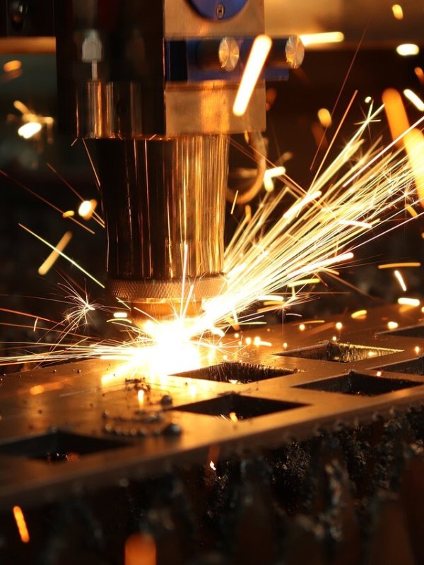 the laser cuts, sparks, production